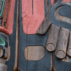 Detail of "Cedar Man Walking Out of the Log," a totem pole in Duncan, British Columbia. Carved by Gwe-la-y-gwe-la-gya-les (Richard Hunt), photo by Rex Wholster.