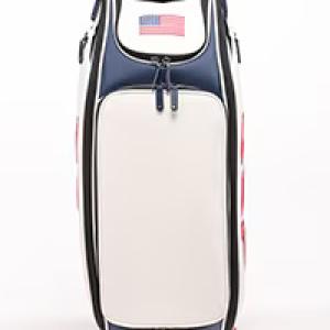 A standing golf bag with American flag on one pocket.