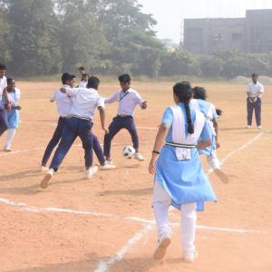 students playing soccer