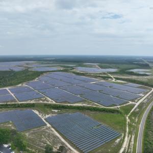 Aerial view of large fields of solar panels