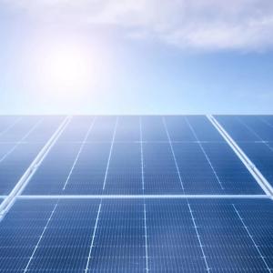 Looking towards the sky, a close up of solar panels.