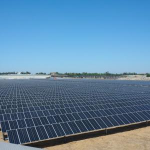 Panoramic view of a large solar panel covered field