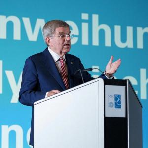 a person speaking at a podium