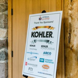 A board with sponsor's logos.