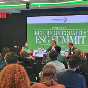 presentation stage with three presenters