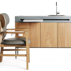 Digital image of specialized nursing chair and sink with pull-out table top