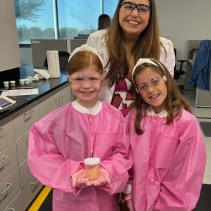 girl scouts with adult