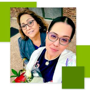 Two people in a selfie pose.