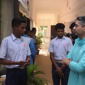 student presenting a poster