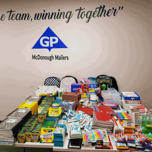 A table covered in school supplies