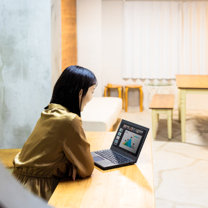 Woman looking at a laptop computer.