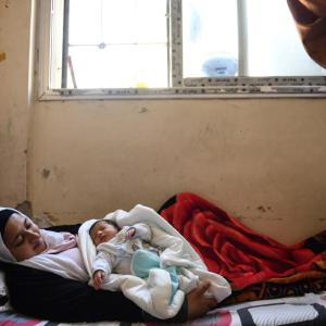 Action Against Hunger helps young women like Haya and her newborn baby by distributing necessities and rebuilding shelters.