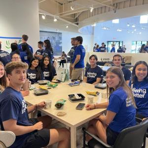 Group of interns sitting at lunch