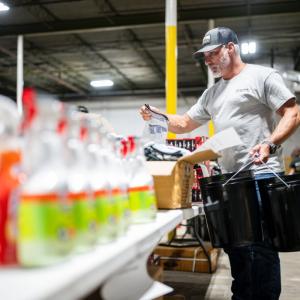 Southwire employee packing flood relief bucket