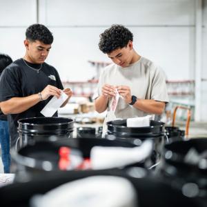 Southwire volunteers applying stickers