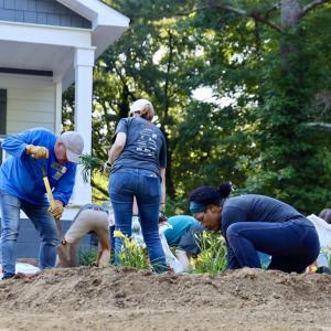 people building a house