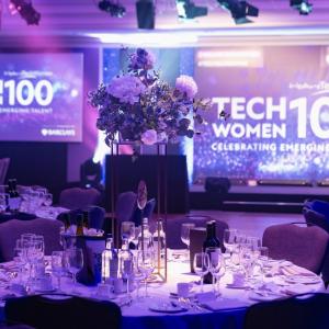 Award dinner setting with dark purple lighting