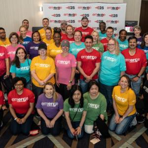Group of people in Emerge t-shirts