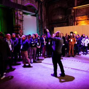 Tour group inside the Solutions Fair