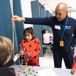 Kids getting their tower measured