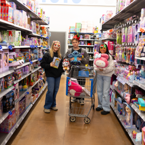 Volunteers shopping for Christmas gifts