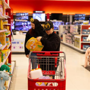 Volunteers shopping for Christmas gifts
