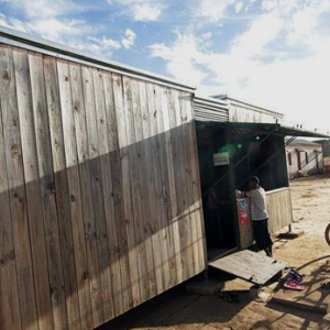 Person on bicycle outside energy kiosk