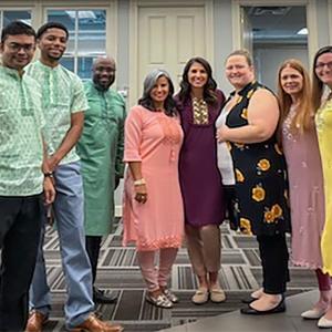 Group of employees wearing traditional clothing from Bangladesh