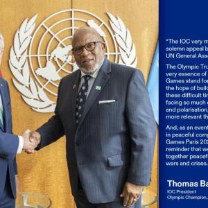 Dennis Francis and Thomas Bach smiling and shaking hands. Quote from Thomas Bach on the right side.