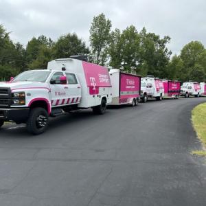 line of T-Mobile trucks