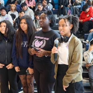 Students step forward to ask questions and share their interests during the interactive career panel, gaining firsthand insight into opportunities in sports and entertainment.