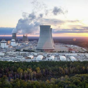 Aerial view of Vogtle power plant. Steam coming from two tall stacks.