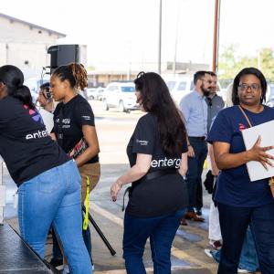 A chain of volunteers passing boxes.