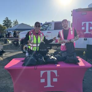 volunteers at a booth