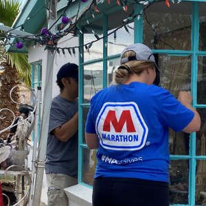 Volunteer in a "Marathon" t-shirt 