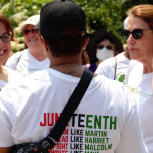 People talking in a group outside.