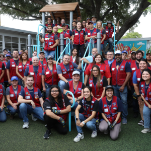 Lowe’s Volunteers pose on a newly built playground.