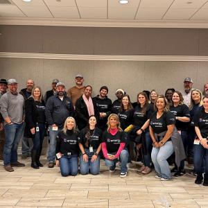 A group of volunteers posed