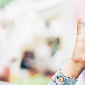 A smiling person using a VR headset