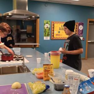 Students making tacos