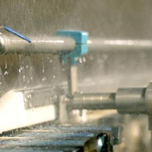 Water spraying out of a tap