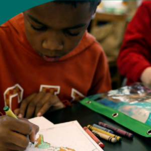 Children coloring pages next to each other.