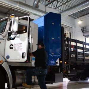 Cummins employee getting into hydrogen truck