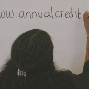 someone teaching at whiteboard