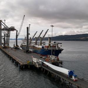 Large wind turbine components being unloaded from a vessel at DP World’s Lirquén terminal in Chile.