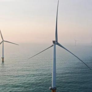 Offshore wind turbines in the fog.