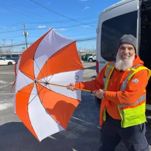 Paul Manzi with umbrella