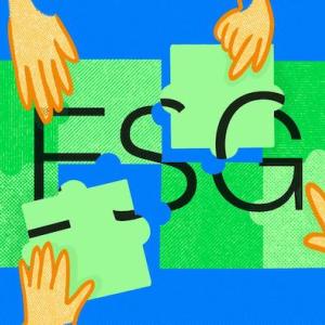 ESG in a green puzzle board with 4 hands each holding a piece.