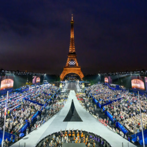 a large crowd in front of the Eiffel Tower