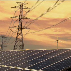 A long row of solar panels under large power lines